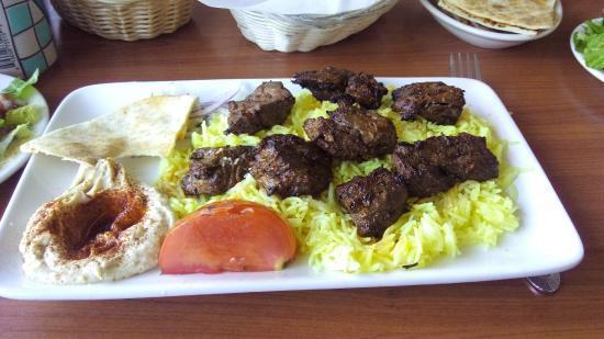 Beef Kabob Plate · Served with seasoned rice and a salad of mixed greens, tomatoes, and cucumber.
