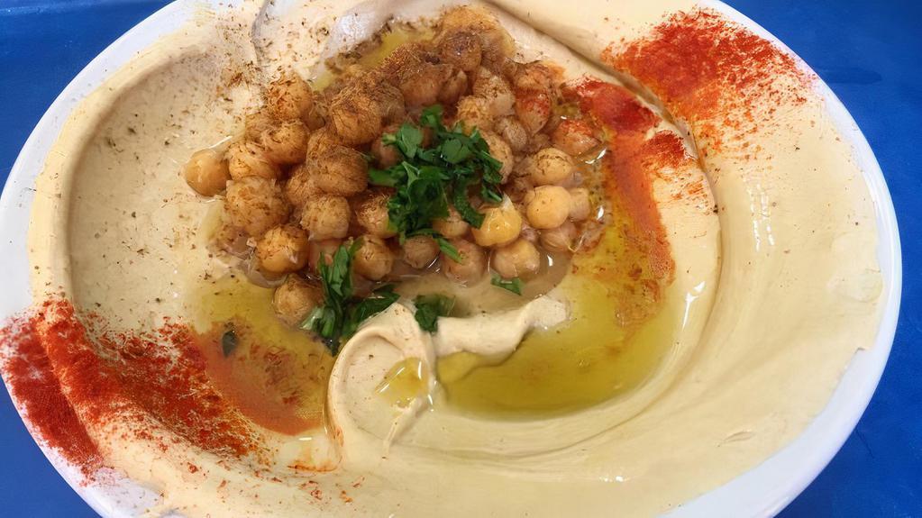 Original Hummus · Pureed chickpeas with olive oil. Served with pita.