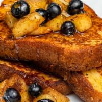 Vegan French Toast And Fruit Platter · 2 Vegan French Toast with Fried Cinnamon Apple and Blueberries, with a Sprinkle Powdered Sugar