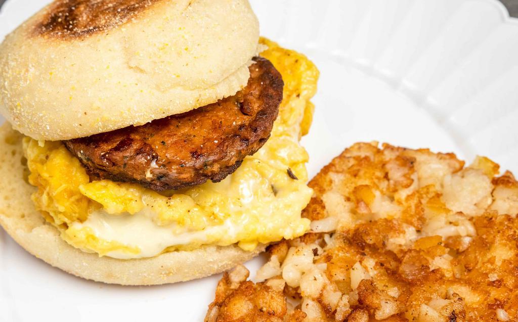 Vegan Sausage And Egg · Vegan Sausage, Egg Patty and Cheese Served on  Bagel with Hash Brown.