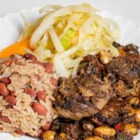 Vegan Oxtails And Red Beans And Rice  · Vegan Hand Crafted V-Oxtails, Mix of Black-Eyed Peas, Mushrooms, and ChickPeas Roll, served ...