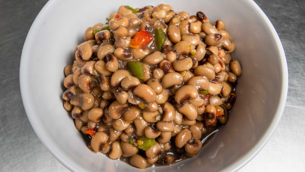 Vegan Black-Eyed Peas  · Sautéed seasoned black-eyed peas and mix peppers.