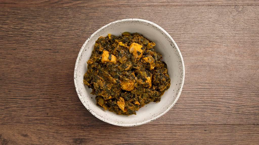 Chicken Saag · Chicken and spinach with garlic and fresh spices.