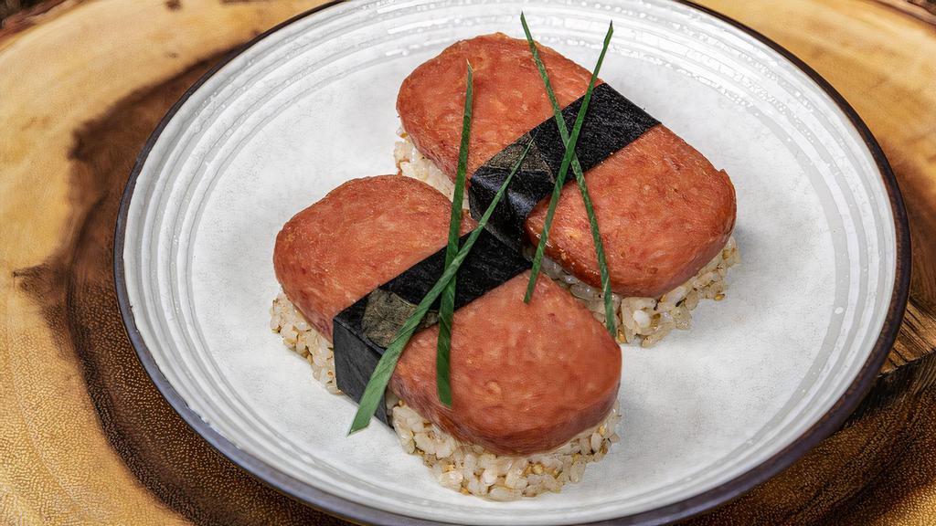 Two Spam Musubi · A very popular Japanese snack and great for kids. Two pieces of grilled spam served as a sushi with furikake rice and nori.