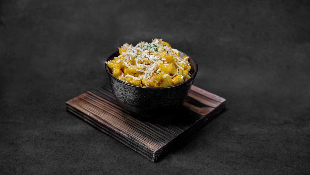 Brown Butter Mac & Cheese · Macaroni prepared with a homemade cheese sauce, beurre noisette, and bread crumbs.