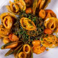 Squid Ink Linguini · shrimp, mussels, Little Neck clams, calamari, cherry tomatoes, fresh herb, wine white tomato...