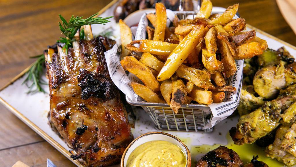 Mix Grill · Serves 2 people. spit-roasted baby lamb, chicken tossed in a herb-mustard-garlic sauce, country style pork-leek sausage, grilled kebab, hand-cut fries