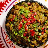 Kuchmachi Hot · Chicken gizzards with walnuts and pomegranate seeds