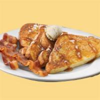 Bg01A. French Toast · French toast prepared with fresh ground cinnamon and served with butter and syrup.