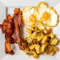 American Breakfast · Two egg, bacon toast, home fries.
