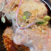 Lamb Meatball · Lamb meatballs, roasted garlic, tomato sauce, fontina cheese