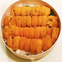 Uni Don · Sea urchin on a bed of steamed white rice.