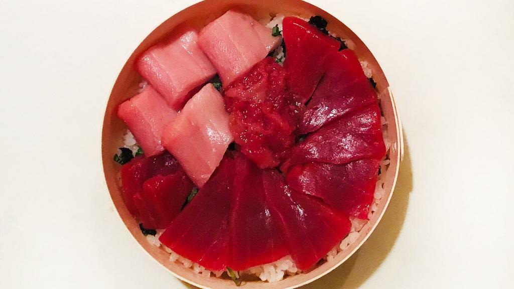 Tekka Don · Bluefin tuna on a bed of steamed white rice.