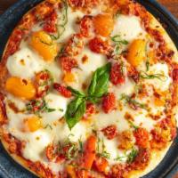 Margherita · Fresh mozzarella, roasted tomatoes & basil.