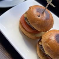 Beef Sliders · Lettuce, tomato, pickles & cheese.