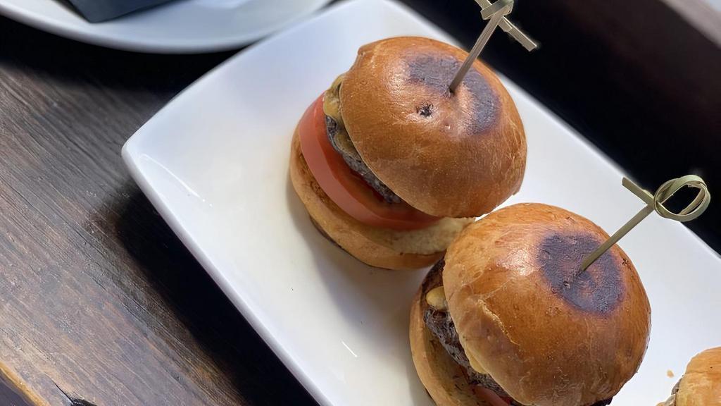 Beef Sliders · Lettuce, tomato, pickles & cheese.