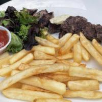 Steak Frites · Chimichurri butter & hand cut fries.