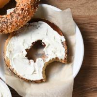 Poppy Bagel · Perfect poppy seed bagel with your choice of spread.