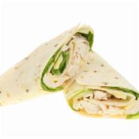 Chicken Caesar Wrap · Perfectly grilled chicken wrap with garlic croutons, artfully shredded Parmesan and Italian ...