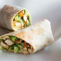 Chicken Salad Wrap · Wonderful white chicken salad, Pepper Jack cheese, creamy avocado, lettuce, and tomato in a ...