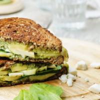 Blue & Green Sandwich · 7 grain sandwich filled with avocado, green apple, crumbled bleu cheese, cucumber, baby spin...