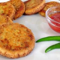Chicken Shami Kebab · Desi kebabs made with minced chicken, chana daal and traditional spices. ( 2 kebabs)