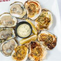 Raw Oysters · 1/2 Dz. Raw Oysters On A Half Shell Served with Lemon & Saints Sauce.