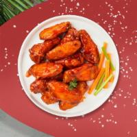 Best In Buffalo Wings · Fresh vegan wings breaded, fried until golden brown, and tossed in buffalo sauce. Served wit...