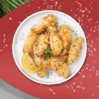 Parm Out Wings · Fresh vegan wings breaded, fried until golden brown, and tossed in garlic and parmesan. Serv...