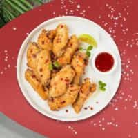 Miss Chili Wings · Fresh vegan wings breaded, fried until golden brown, and tossed in sweet chili sauce. Served...