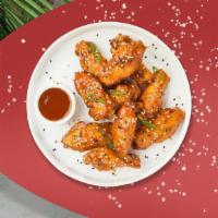 Oriental'S Best Wings · Fresh vegan wings breaded, fried until golden brown, and tossed in sweet and sour sauce. Ser...