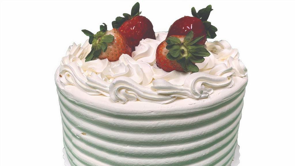 Strawberry Shortcake · Vanilla Cake with Fresh Strawberries and Whipped Cream topped with Whipped Cream Icing