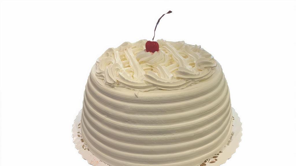 Fruit Salad Cake · Vanilla Cake filled with Fresh Strawberries, Bananas, Peaches and Pineapples topped with Whipped Cream Icing