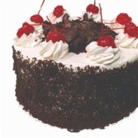 Black Forest · Chocolate cake filled with chocolate whipped cream and black cherries, topped with cherries,...