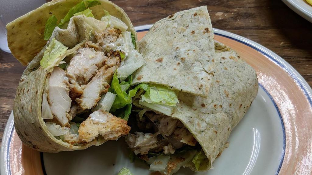 Grilled Chicken Caesar Wrap · Grilled chicken breast, romaine lettuce, croutons, parmesan cheese and Caesar dressing.