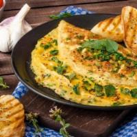 Mediterranean Omelette · With peppers, onions, tomatoes, mushrooms and feta cheese.