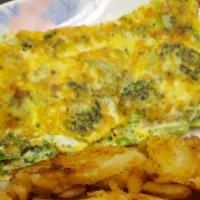 Broccoli Cheddar Omelette · Served with home fries.