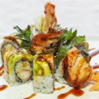 Eel Roll · Freshwater eel and cucumber wrapped in seaweed and rice; drizzled with sweet eel sauce