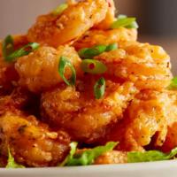 Voodoo Shrimp · Lightly battered shrimp tossed in our homemade sweet and savory Voodoo sauce