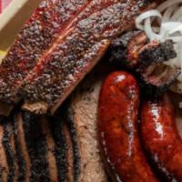 Choose Any Two Bbq · Your choice of two BBQ smoked meats, with mash and vegetables.  Note:  red smoke ring may ex...
