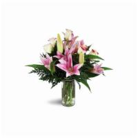 Alluring Roses And Lilies · Have a special anniversary coming up? This array of soft creamy roses and sweet pink lilies ...