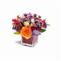 Remarkable Red! · How remarkable! This warm, red-toned arrangement is a special gift for a special person! A b...