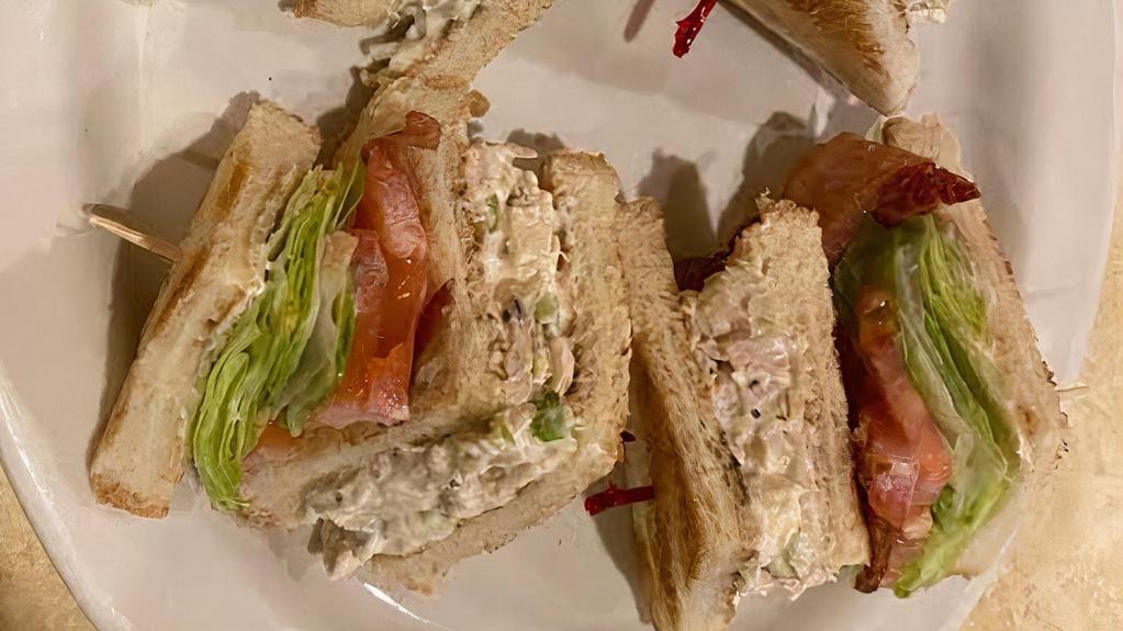 Chicken Salad Club · With bacon, lettuce, tomato and mayonnaise.