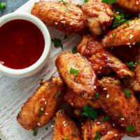 Buffalo Chicken Wings · Baked, hot crispy wings.