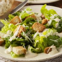 Caesar Salad · Romaine lettuce, sliced Romano cheese and garlic roasted croutons.