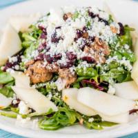 Pear Salad (Family) · Sliced pears, cranberries, caramelize walnuts, and crumbled blue cheese over tricolor salad ...