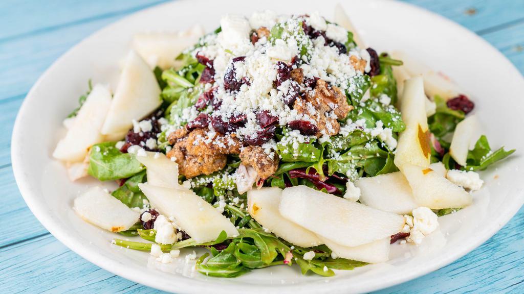 Pear Salad (Family) · Sliced pears, cranberries, caramelize walnuts, and crumbled blue cheese over tricolor salad with honey balsamic vinaigrette dressing.