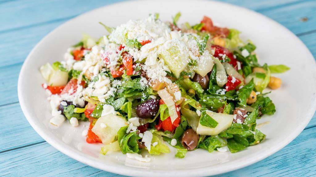 Cassie'S Chopped Salad (Individual) · Romaine lettuce, cucumber, feta cheese,  tomato, olives, chickpeas., roasted red peppers with homemade Italian vinaigrette dressing.