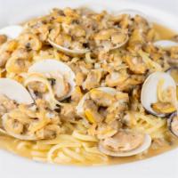 Linguine Clam Vongole (Individual) · Whole clams,  garlic, and extra virgin olive in a white or red clam sauce.