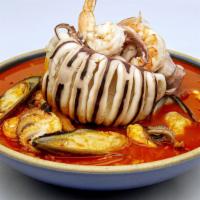 Spicy Seafood Soup (Jjam-Pong) · Korean style stir-fried pork belly, whole calamari, shrimp, mussel & vegetable in spicy soup...